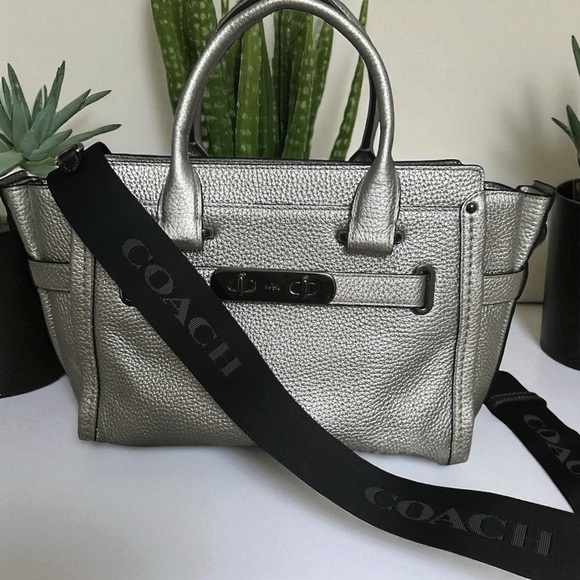 Coach Handbags - NWT Coach Pebble Swagger 27 Silver Crossbody + NWT Black Webbing Strap/Dust bag